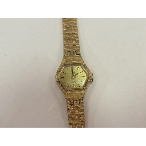 1317 - A lady's 9ct gold watch a/f together with a Limit lady's watch (2)