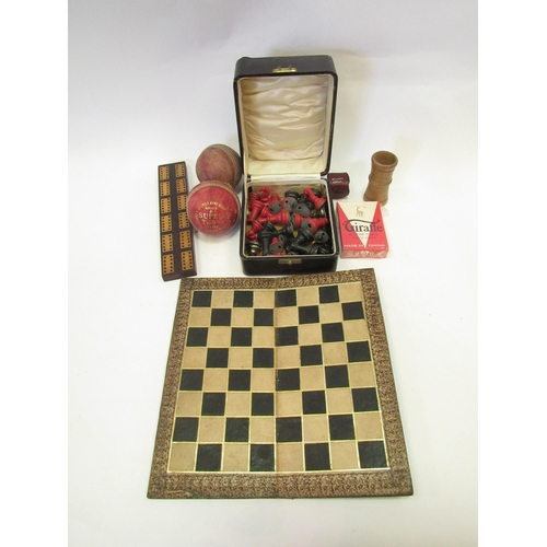 1320 - A lead chess set, sealed pack of cards, cribbage board, dice shaker and billiard chalk, etc