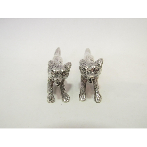 1333 - Two silver fox form knife rests