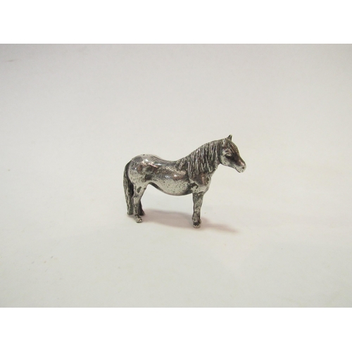 1334 - A silver horse, 3.5cm tall