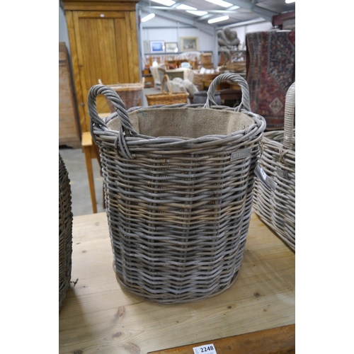 2250 - A wicker log basket hessian lined