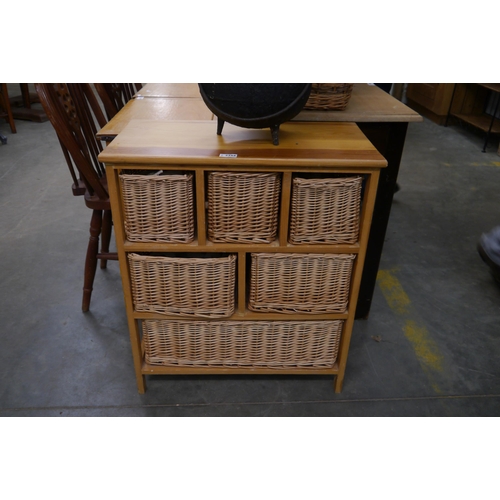 2256 - A pine unit with six wicker drawers linen lined