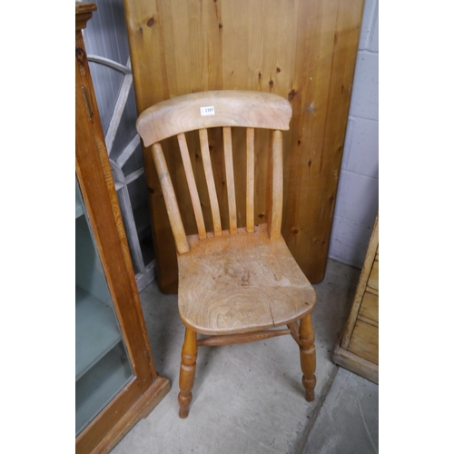 2287 - A Victorian elm seated kitchen chair