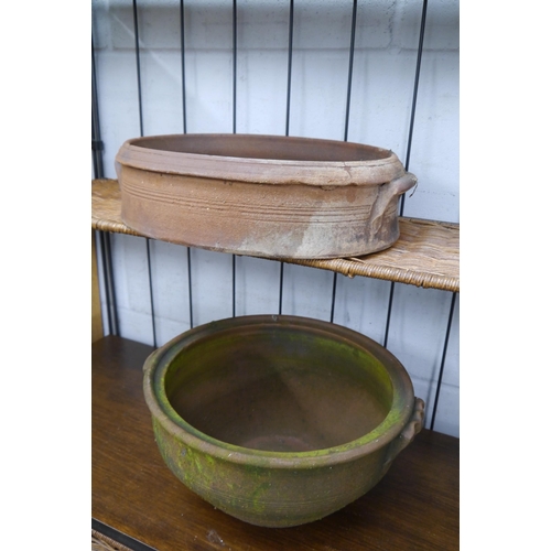 2297 - Two early 20th Century terracotta pots circular and oval (2)