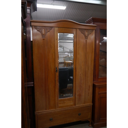 2312 - An Edwardian satinwood wardrobe with shaped cornice single drawer to base    (E) £8-12