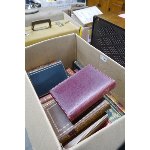 2321 - A box of leather bound books