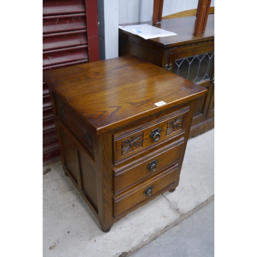 2352 - An Old Charm oak chest of three drawers