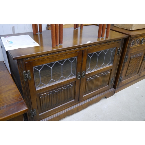 2354 - An Old Charm oak and lead glazed cabinet