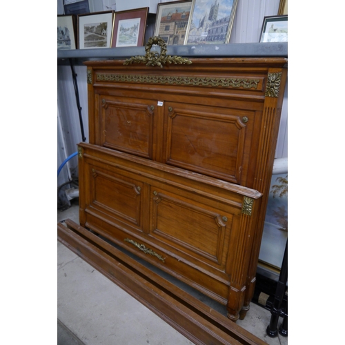 2360 - A French walnut double bed, 140cm wide, some fixing bolts missing