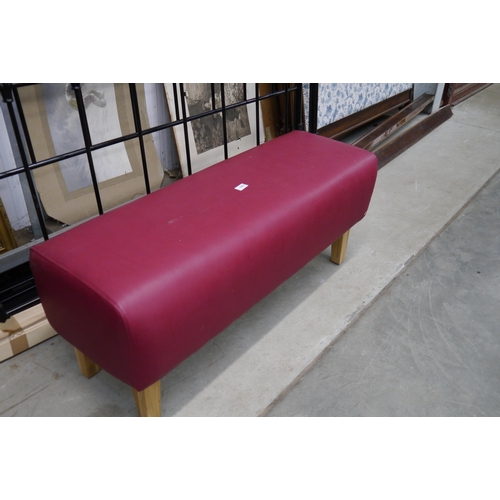 2363 - A red upholstered bench seat