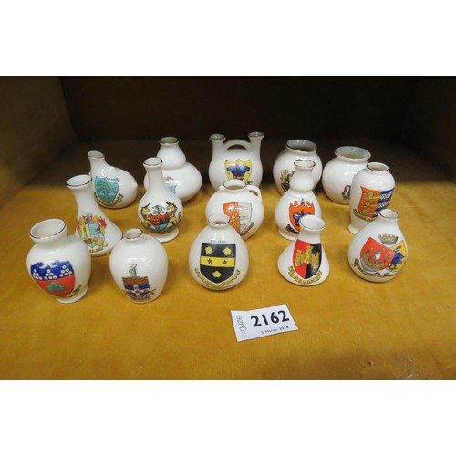 2162 - Fifteen miniature crested ware vases   (R) £15