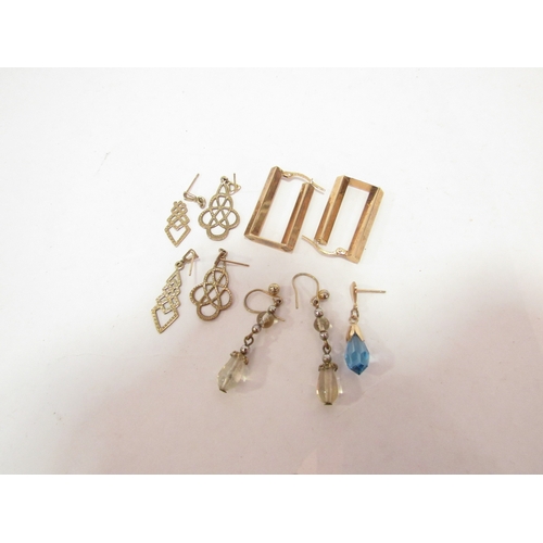 1350 - A pair of elongated earrings stamped 375, three further pairs (one a/f) and an odd earring