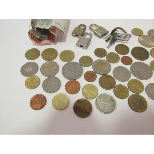 1351 - A purse of foreign currency including 10 and 5 Euro notes, miniature padlocks etc.