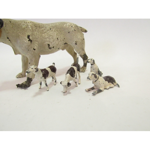 1372 - A cold painted bronze figure of a Jack Russell Terrier (foot a/f) together with four small metal bro... 