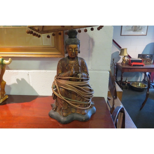 1037 - A Buddha form gilt table lamp