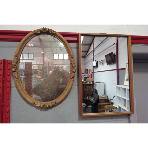 1271 - An oval wall mirror with applied carved roses and a 1960's dressing table mirror     (group)