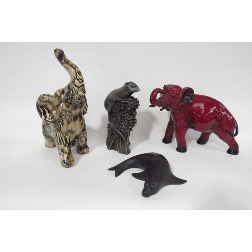 1298 - A Royal Doulton flambe elephant a/f, collage elephant, field mouse on corn, seal (4)