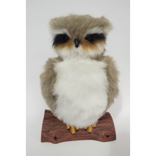 1299 - A soft toy hooting owl with turning head, 27cm tall