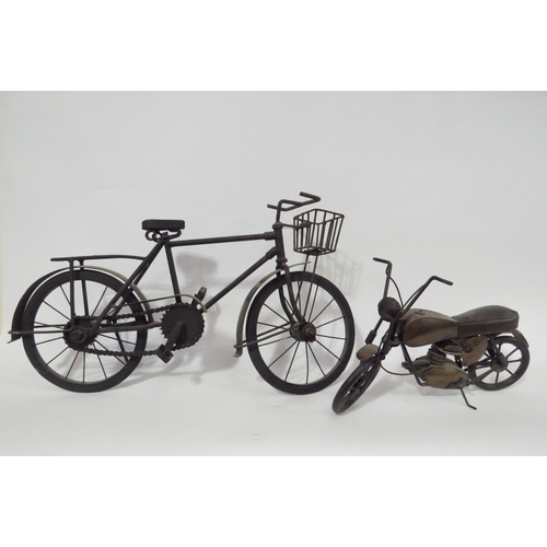 1303 - A quantity of metal models of bicycles including penny farthing