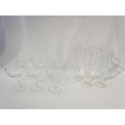 1421 - A quantity of champagne flutes, saucers and associated glasses   (E)£10-20