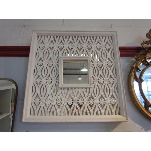 1423 - A 1940's bevel edged wall mirror, a 20th Century gilt mirror and a white closed fretwork mirror (3) ... 