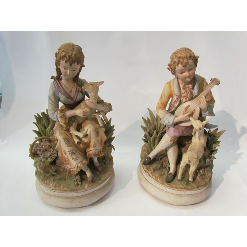 1425 - A pair of Italian porcelain figures of gent and lady with sheep, damage present, 34cm tall   (E) £20... 