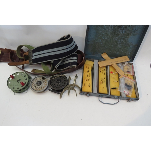 1473 - A box of miscellaneous fishing gear, three reels, metal case of flies, Sam Browne belt, spurs and 9'... 