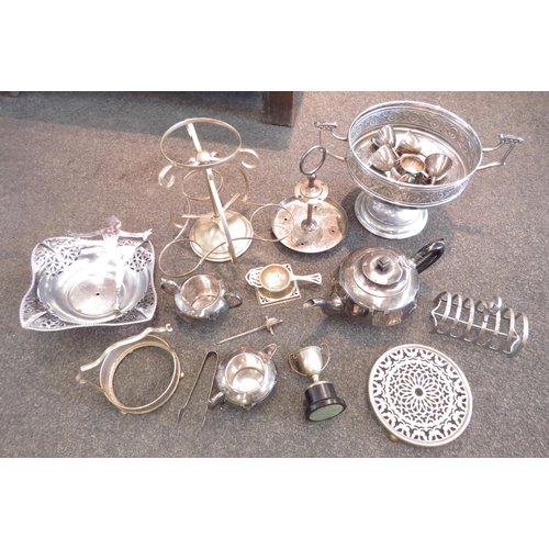 1534 - A box of miscellaneous plated ware, teapot, jug and bowl, egg cups, seven-bar toast rack, etc.