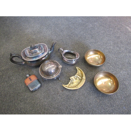 1550 - A box of miscellaneous metalwares to include plated teapot, jug, miniature hip flask, brass moon fac... 