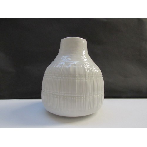 9130 - A Rosenthal ‘Studio-Linie’ gloss white porcelain vase with relief form. Designed by Elsa Fischer-Tre... 