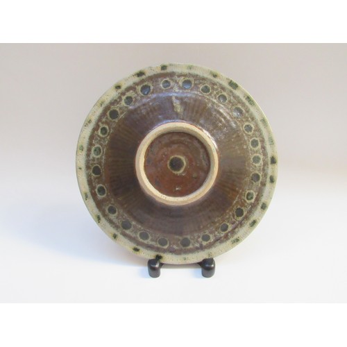 9027 - ERIC JAMES MELLON (1925 - 2014): An early studio pottery plate with ash glaze dot and line detail, s... 