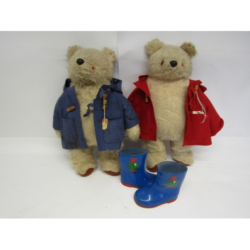 8310 - Two vintage Gabrielle Designs Paddington Bears, one in red duffle coat, the other blue, each 48cm ta... 