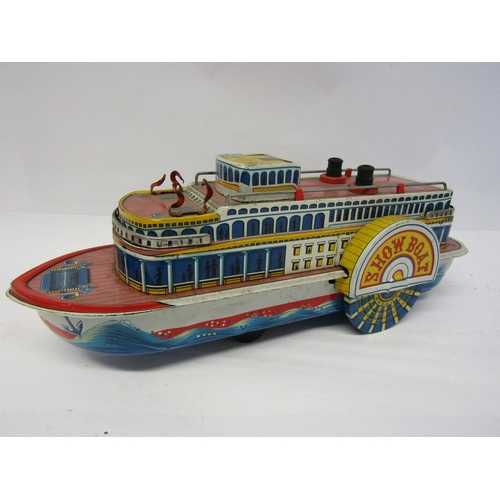 8244 - An unboxed vintage Nomura TN (Japan) battery operated litho printed tinplate Show Boat, 33cm long