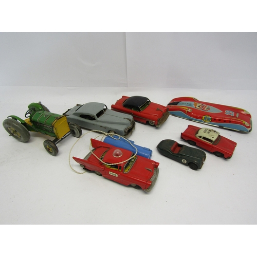 8339 - A collection of loose and playworn tinplate toy vehicles, assorted Japanese, German and British exam... 