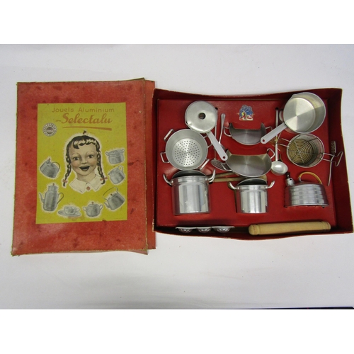 8297 - A 1930s Belgian 'Selectalu' set of dolls kitchen items including aluminium pans and kettle and vario... 