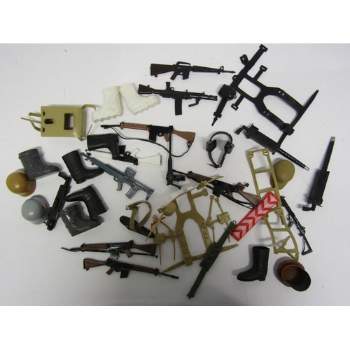 8256 - A collection of assorted vintage and modern playworn Action Man and similar figures, accessories, cl... 