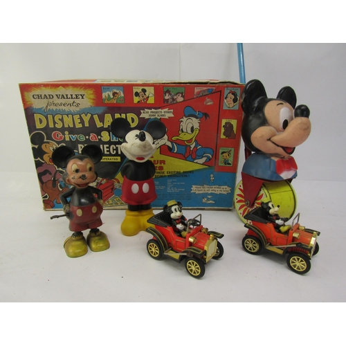 8346 - A collection of vintage Mickey Mouse toys to include two Masudaya tinplate cars, Marx Hong Kong made... 