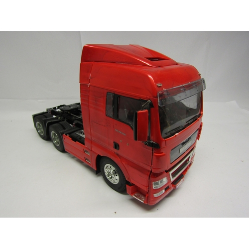 8409 - A Tamiya 1:14 scale kit built radio control MAN TGX 26.540 6x4 XLX Tractor Truck No. 56325, with ins... 