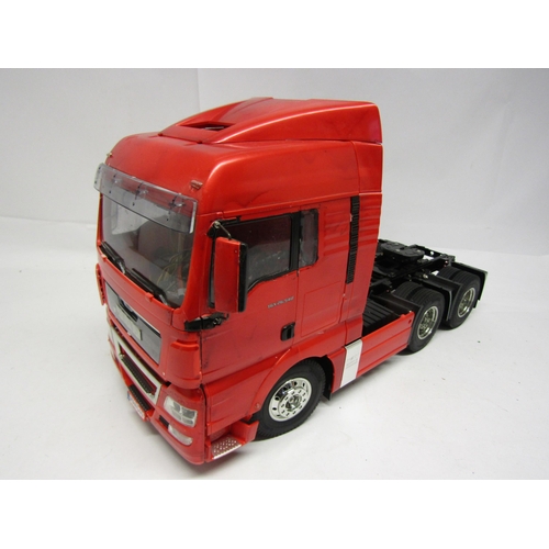 8409 - A Tamiya 1:14 scale kit built radio control MAN TGX 26.540 6x4 XLX Tractor Truck No. 56325, with ins... 