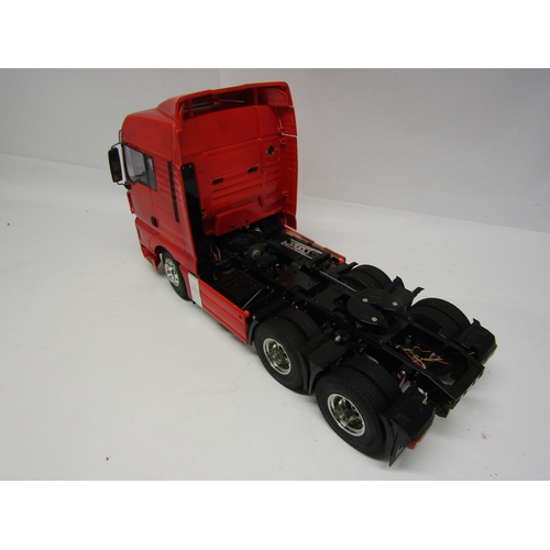 8409 - A Tamiya 1:14 scale kit built radio control MAN TGX 26.540 6x4 XLX Tractor Truck No. 56325, with ins... 