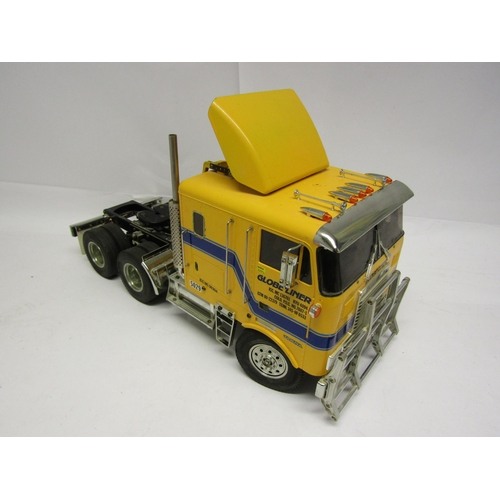 8410 - A Tamiya 1:14 scale kit built radio control Globe Liner Tractor Truck model No. 56304, with instruct... 