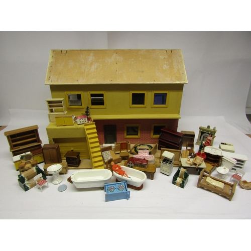 8265A - A wooden dolls house (for restoration) and assorted furniture and accessories      (E) £10-20