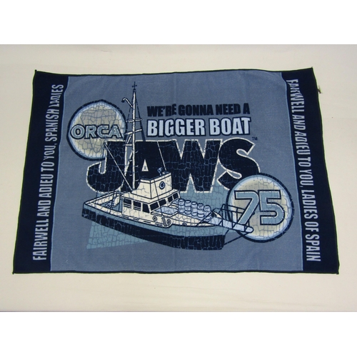 8007 - A collection of film memorabilia and collectables relating to Steven Spielberg's 'Jaws', to include ... 