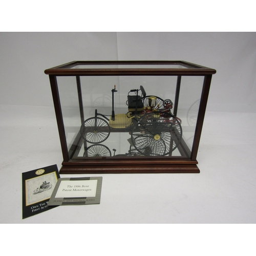 8229 - A Franklin Mint 1:8 scale 1886 Benz Patent Motorwagen, housed in glass display case