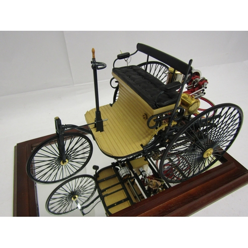 8229 - A Franklin Mint 1:8 scale 1886 Benz Patent Motorwagen, housed in glass display case