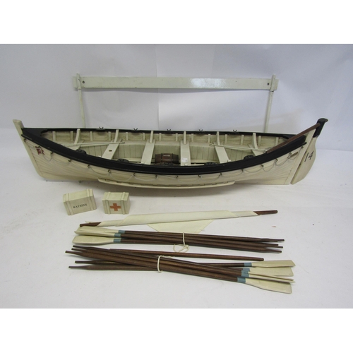 8419 - A scale model of Lifeboat no.14 from RMS Titanic, with ten oars, mast, two water barrels, rations bo... 