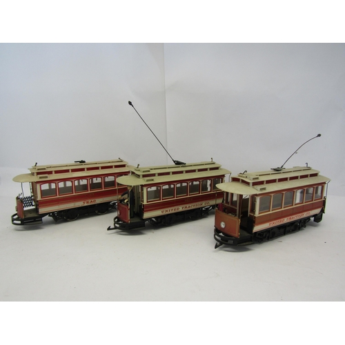 8405 - Two unboxed Bachmann G scale trams / street cars in red and cream United Traction Co. livery, togeth... 