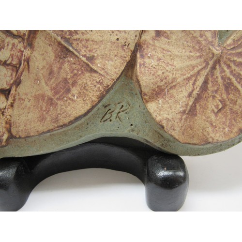 9033 - BERNARD ROOKE (b.1938): A studio pottery dragonfly design plaque, 32cm diameter