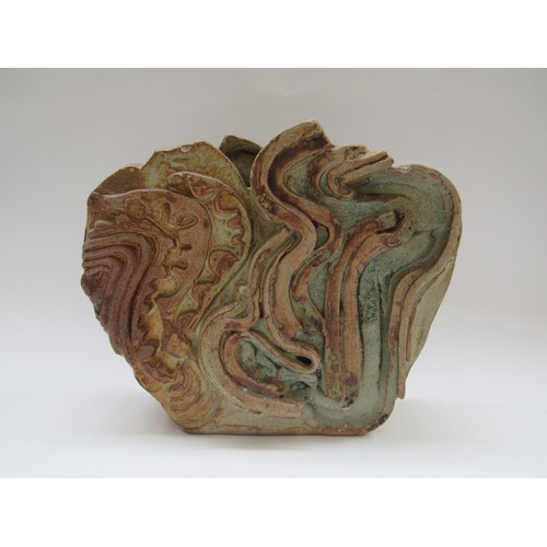 9096 - BERNARD ROOKE (b.1938): A studio pottery abstract form vase, 22cm high (chip to top)