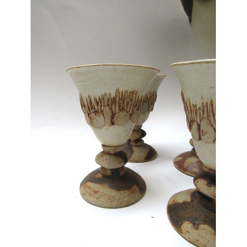 9118 - BERNARD ROOKE (b.1938): A studio pottery pedestal punch bowl together with 12 goblets. Bowl  32cm hi... 